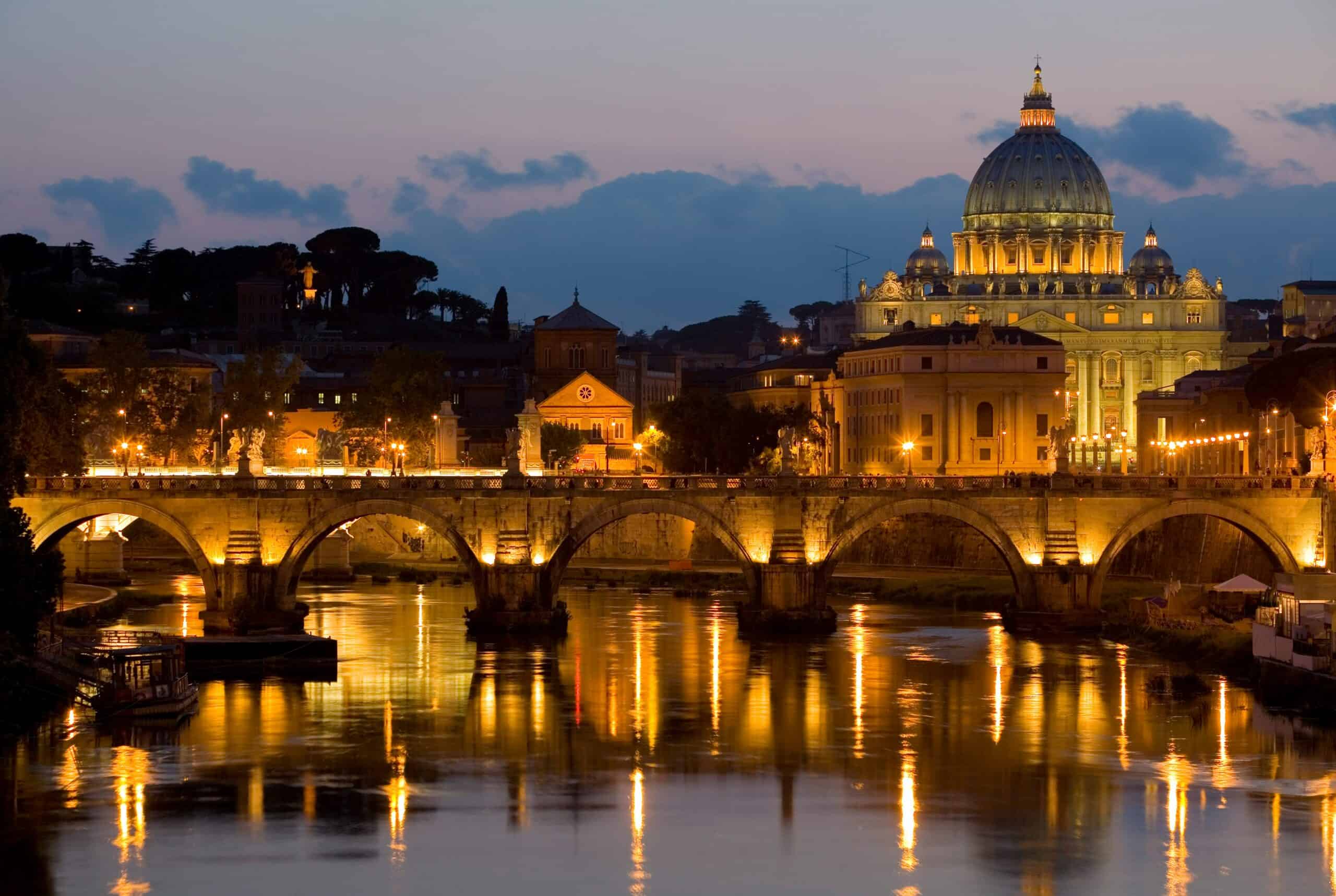 St. Peter’s Basilica dome illuminated at night Vatican City Rome