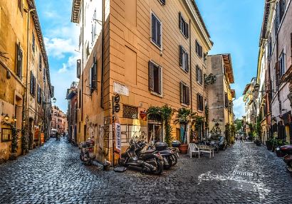 Trastevere Rome historic street with colorful buildings and cobblestone alley in Rome Italy