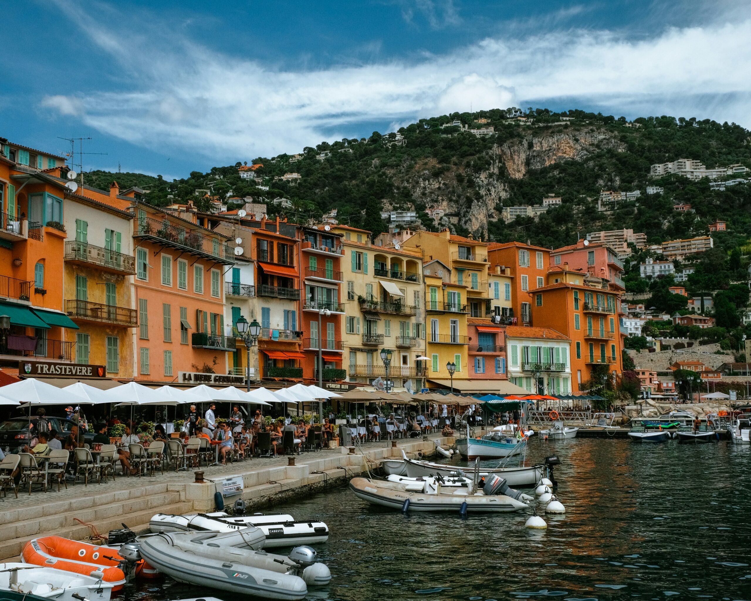 Villefranche-sur-Mer harbor colorful waterfront buildings boats French Riviera coastline view
