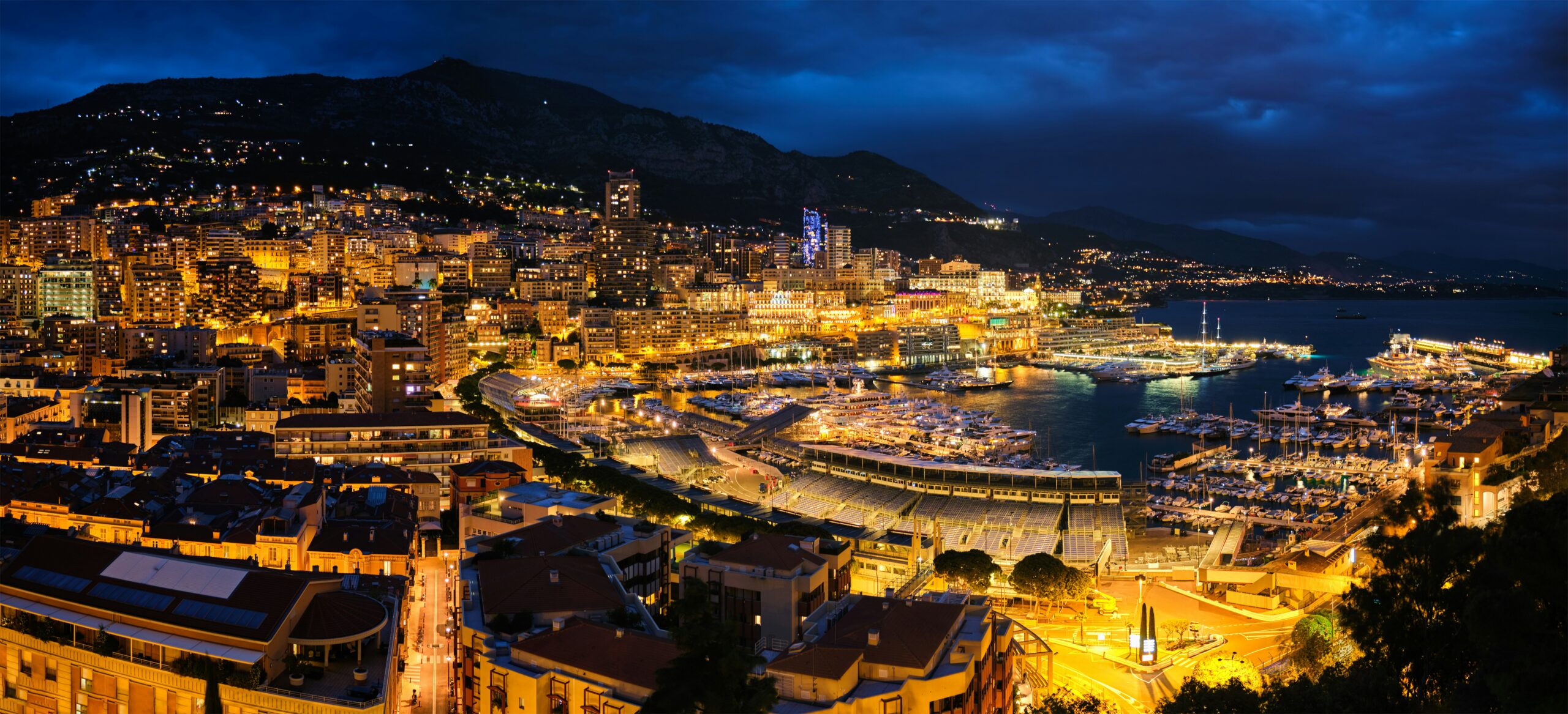 Monaco night skyline harbor lights Mediterranean city view Monaco travel visa destination