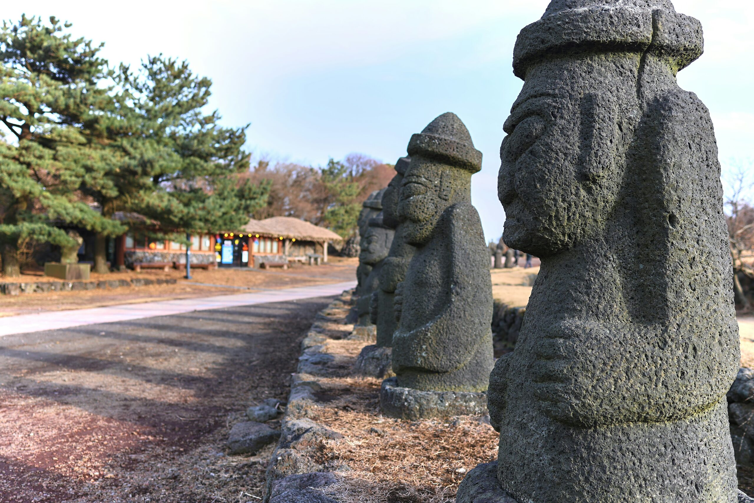 Dol hareubang stone statues at Jeju Folklore & Natural History Museum in Jeju City, South Korea