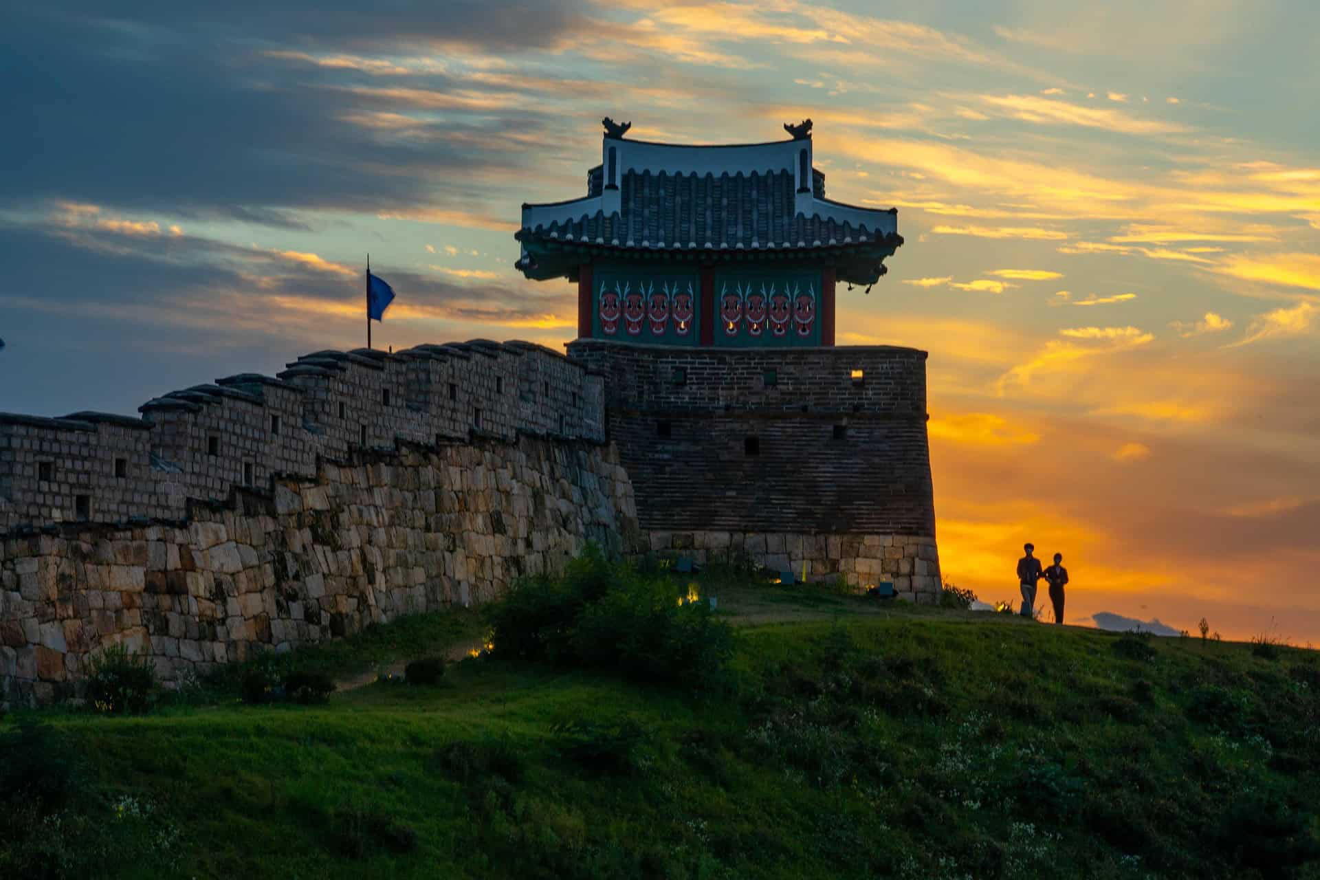 Hwaseong Fortress Suwon wall and watchtower at sunset, UNESCO World Heritage site in South Korea