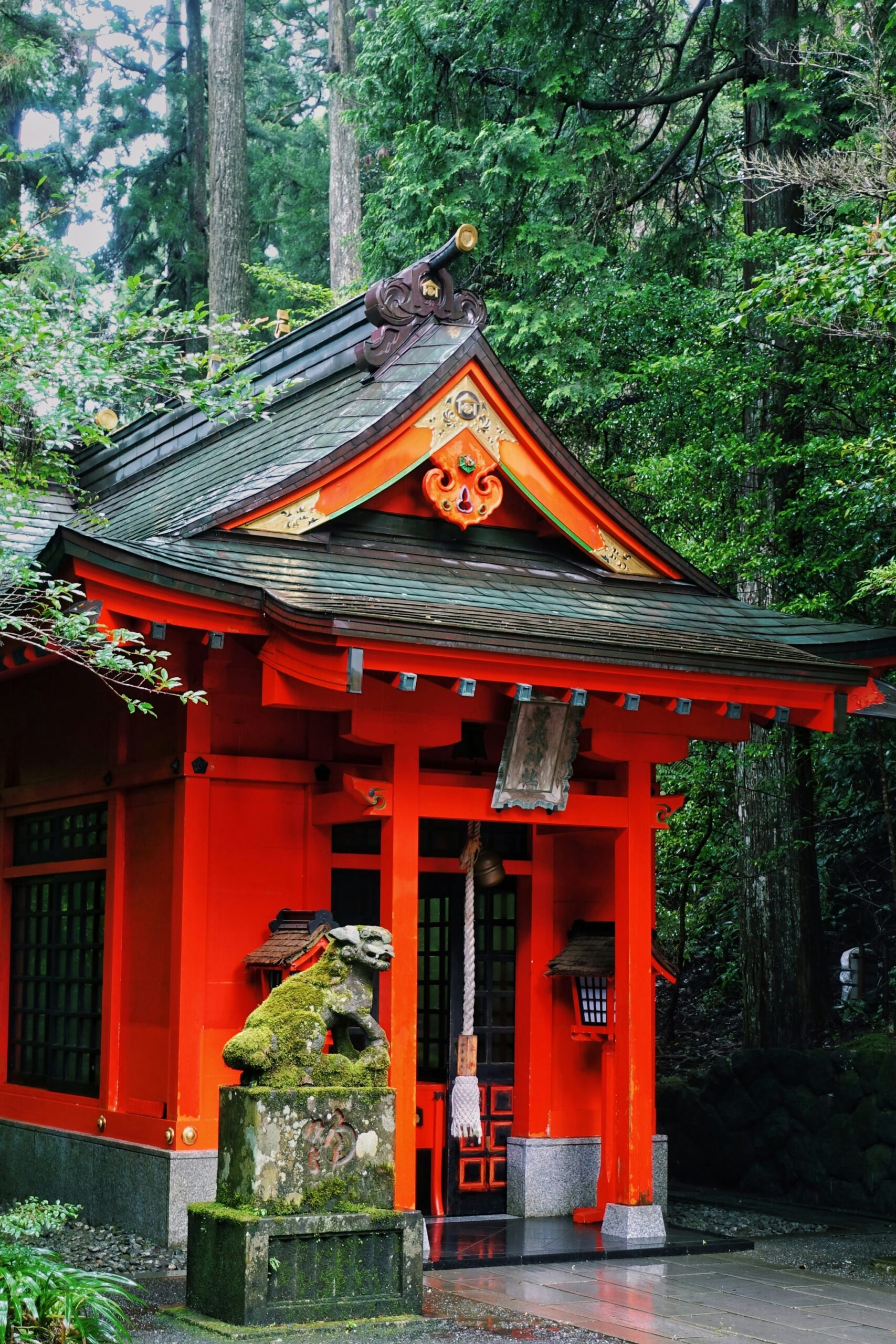 Hakone Shrine forest entrance traditional red shrine building Japan Lake Ashi area