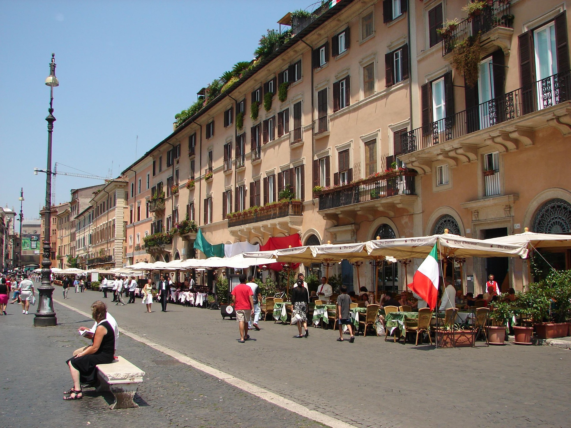 Piazza Navona Rome street scene with cafes and historic buildings Italy