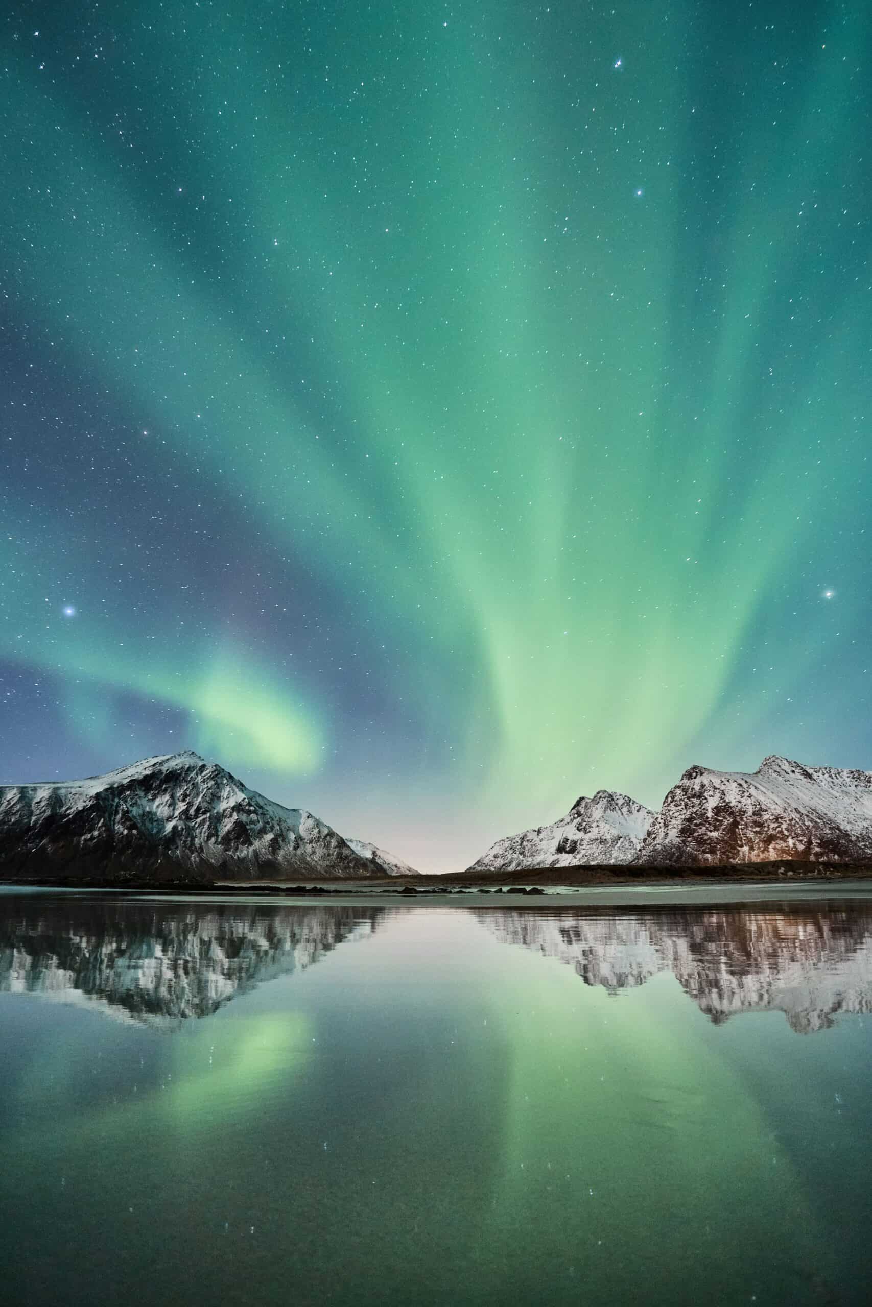 Norway northern lights aurora borealis mountains reflection winter night sky