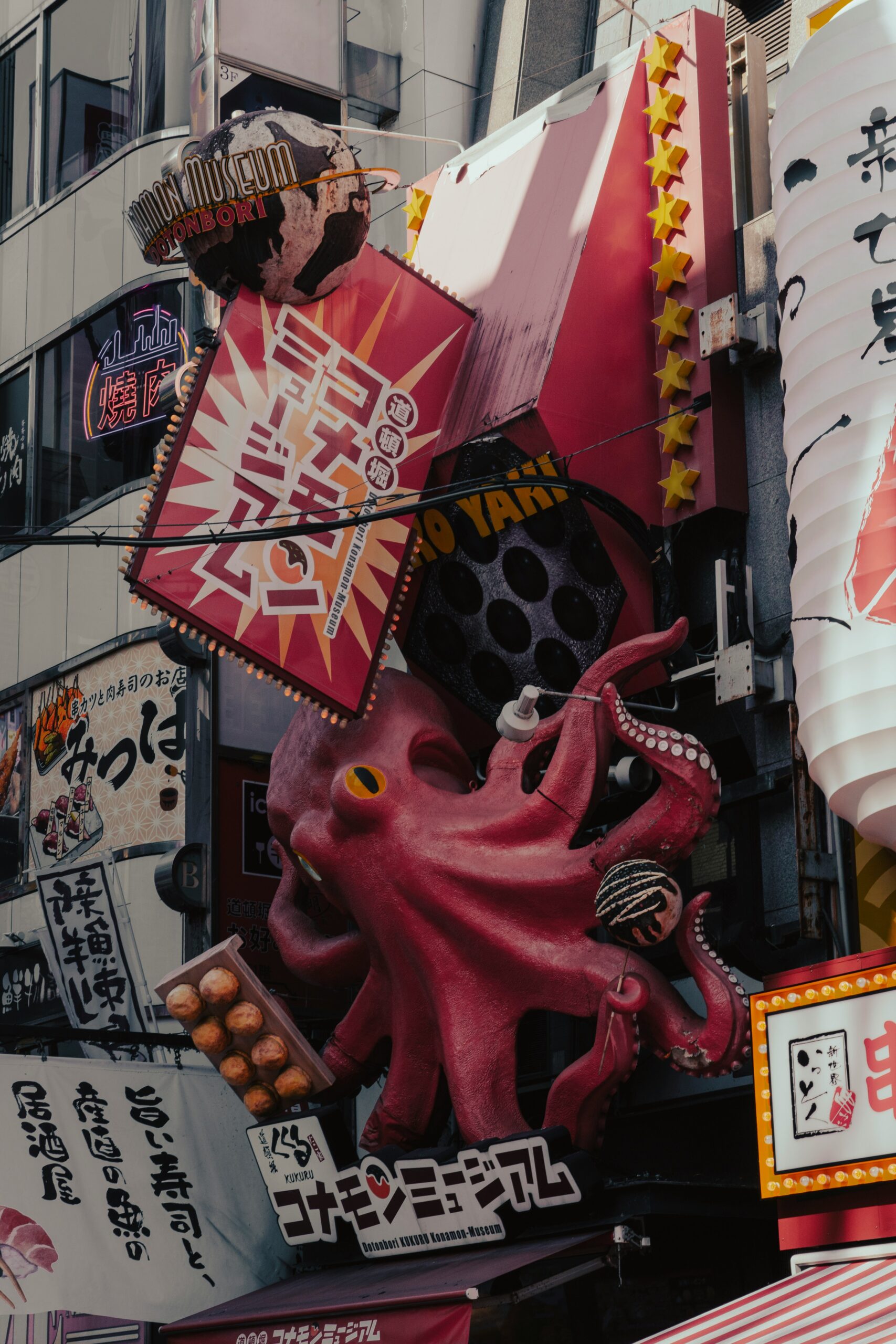 alt="Dotonbori Osaka canal at night with neon lights" 