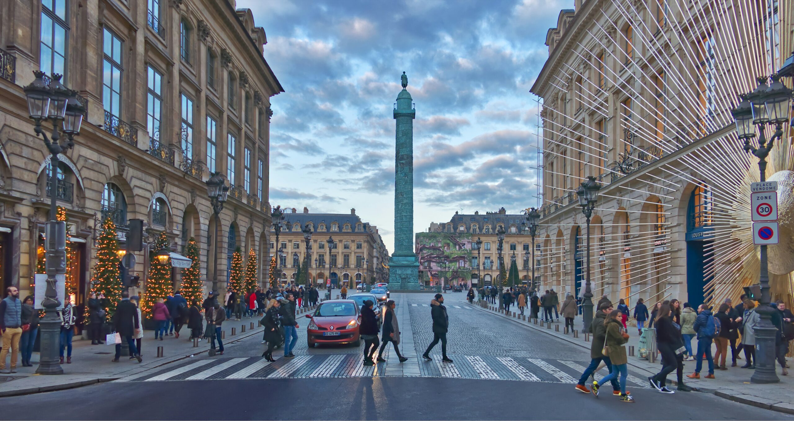 Place Vendôme Paris with the Vendôme Column centered between elegant Haussmann-style façades