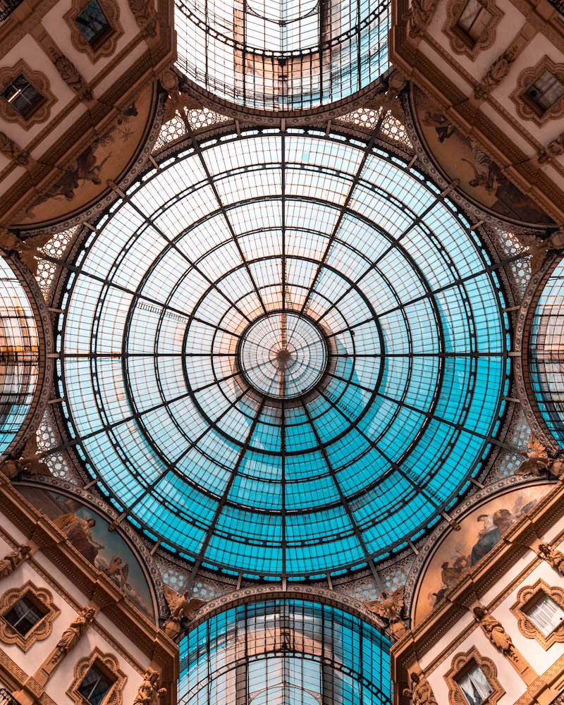 Galleria Vittorio Emanuele II Milan glass dome ceiling and historic arcade interior