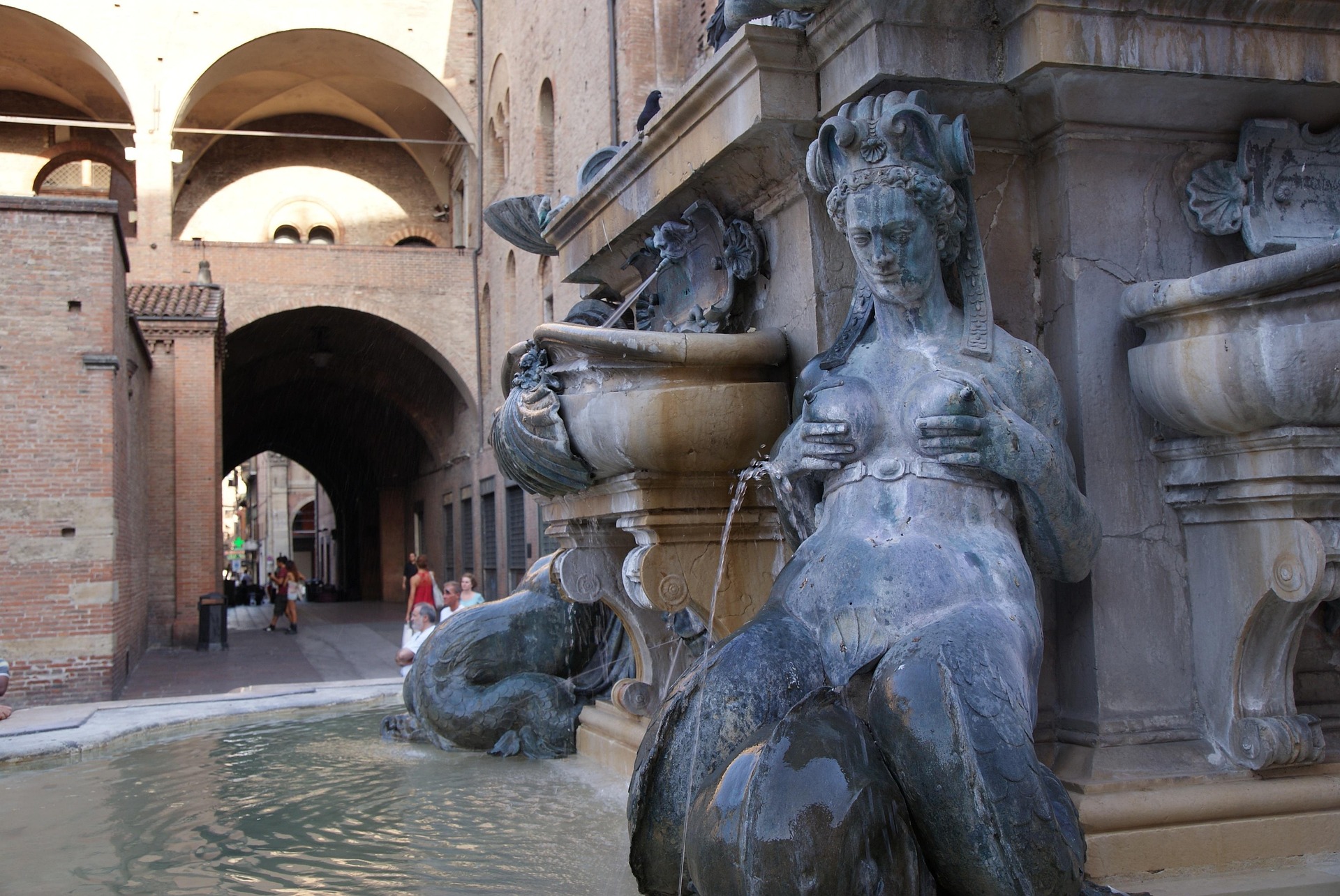 Neptune Fountain statue detail near Piazza Maggiore in Bologna Italy