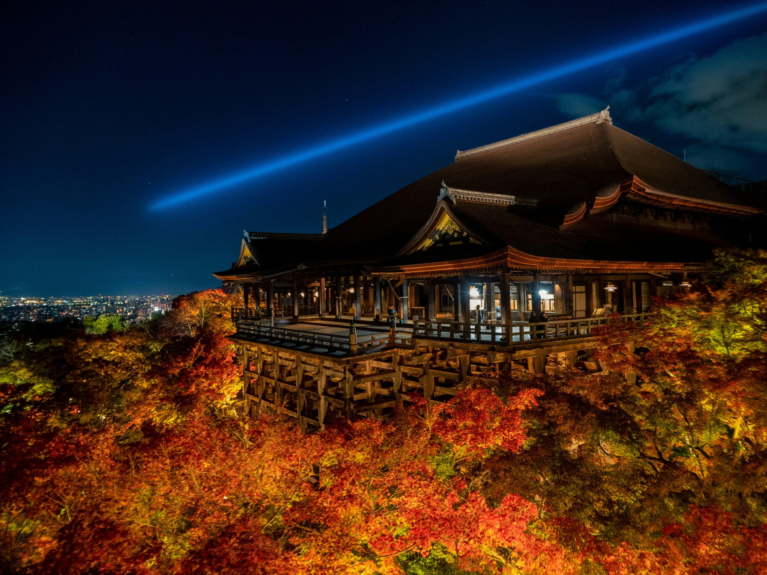 Kiyomizu-dera Temple illuminated at night with autumn foliage in Kyoto Japan