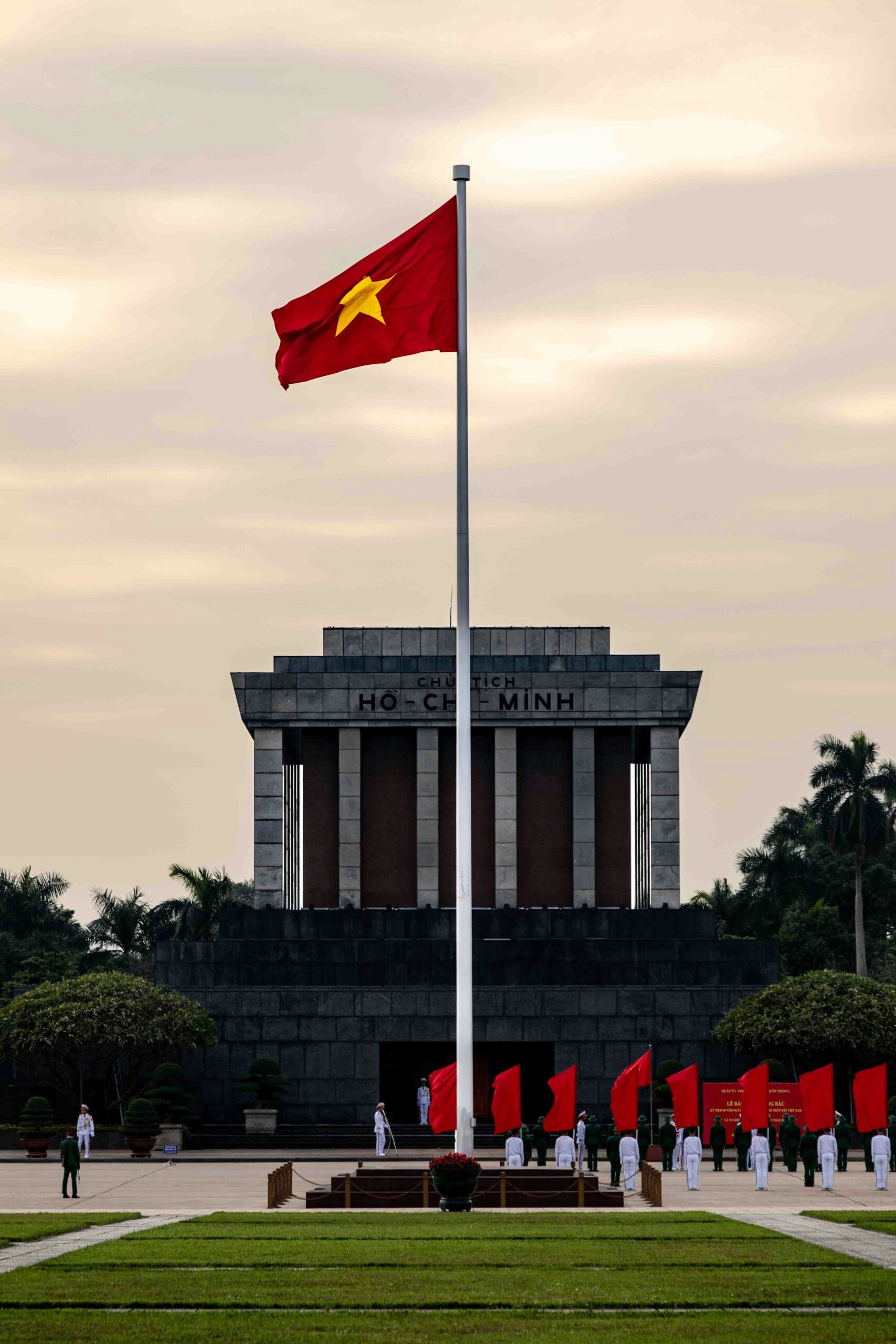 Ho Chi Minh Mausoleum and Ba Dinh Square Hanoi Vietnam with national flag