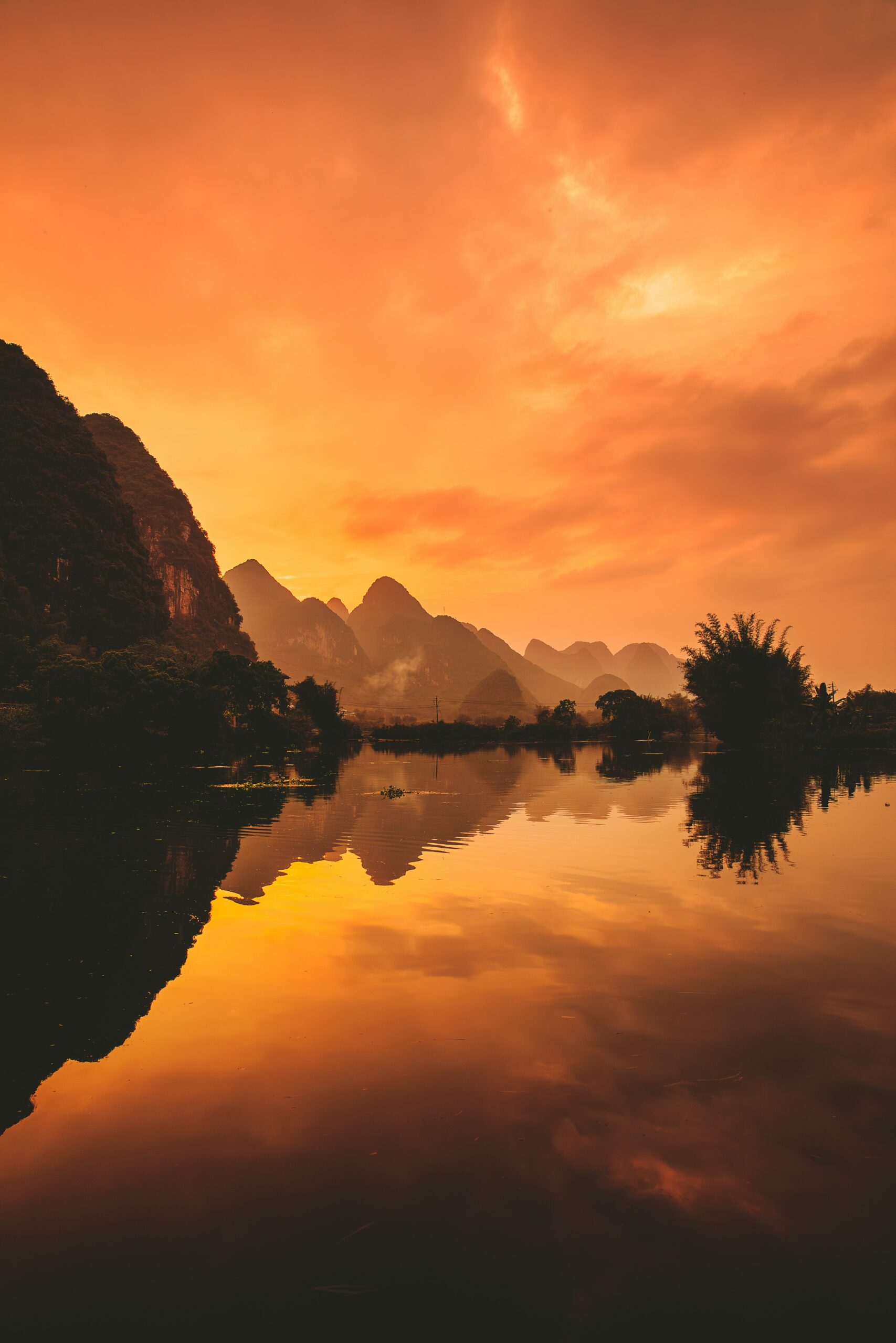 Trang An Landscape Complex sunrise reflection karst scenery Ninh Binh Vietnam