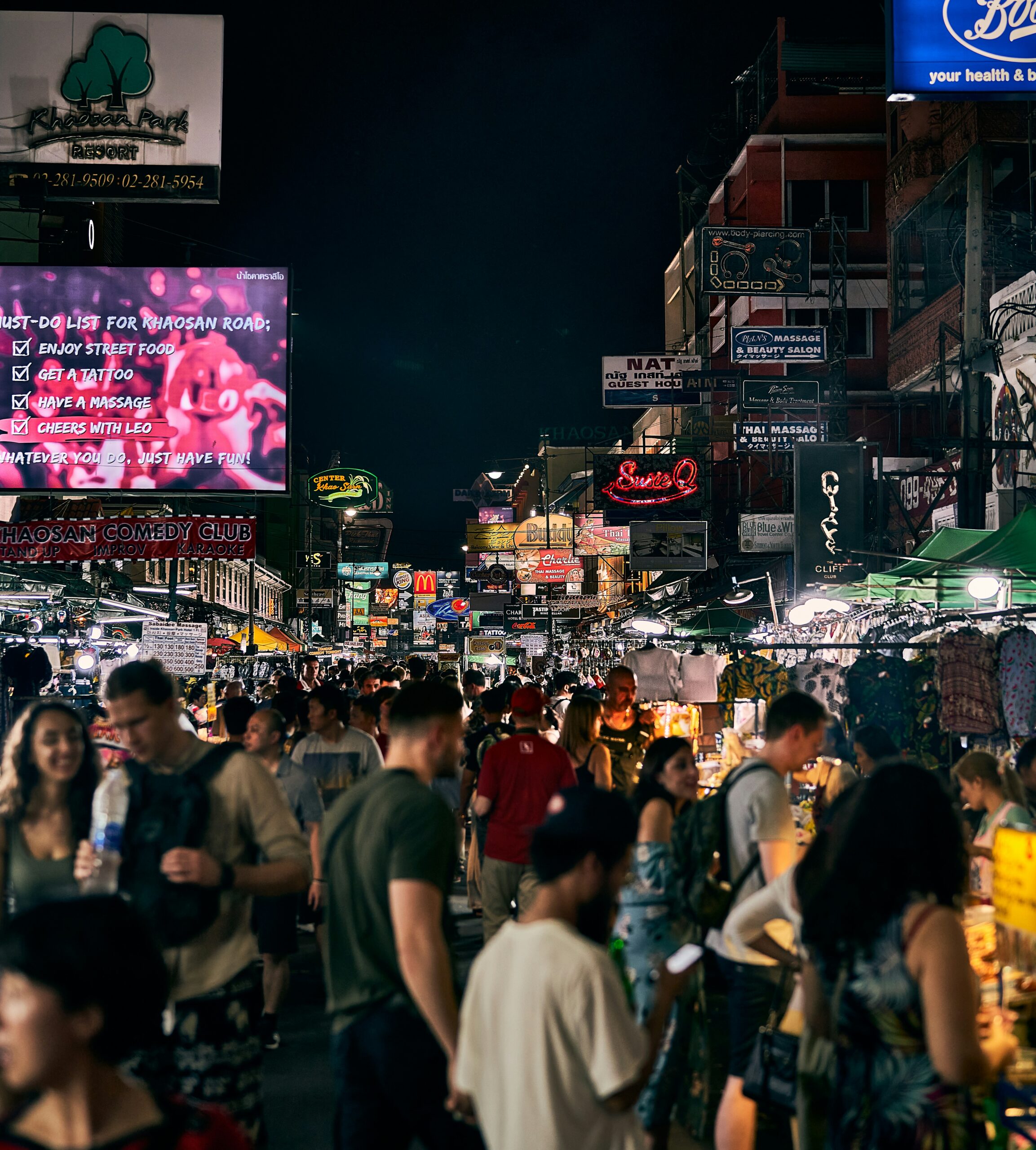 crowded Khao San Road Bangkok at night with backpackers nightlife street Thailand