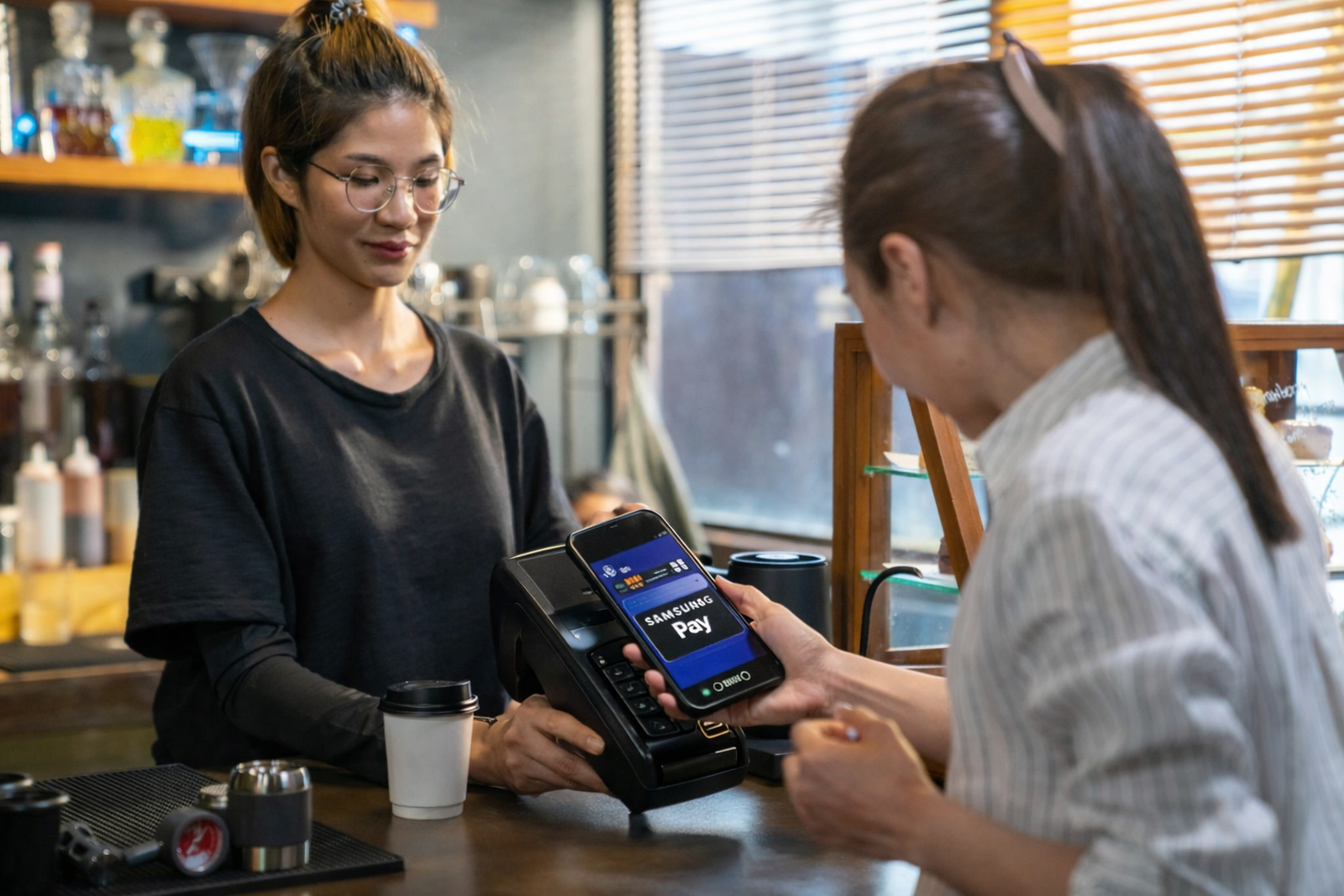 Samsung Pay contactless payment internationally using smartphone at store terminal